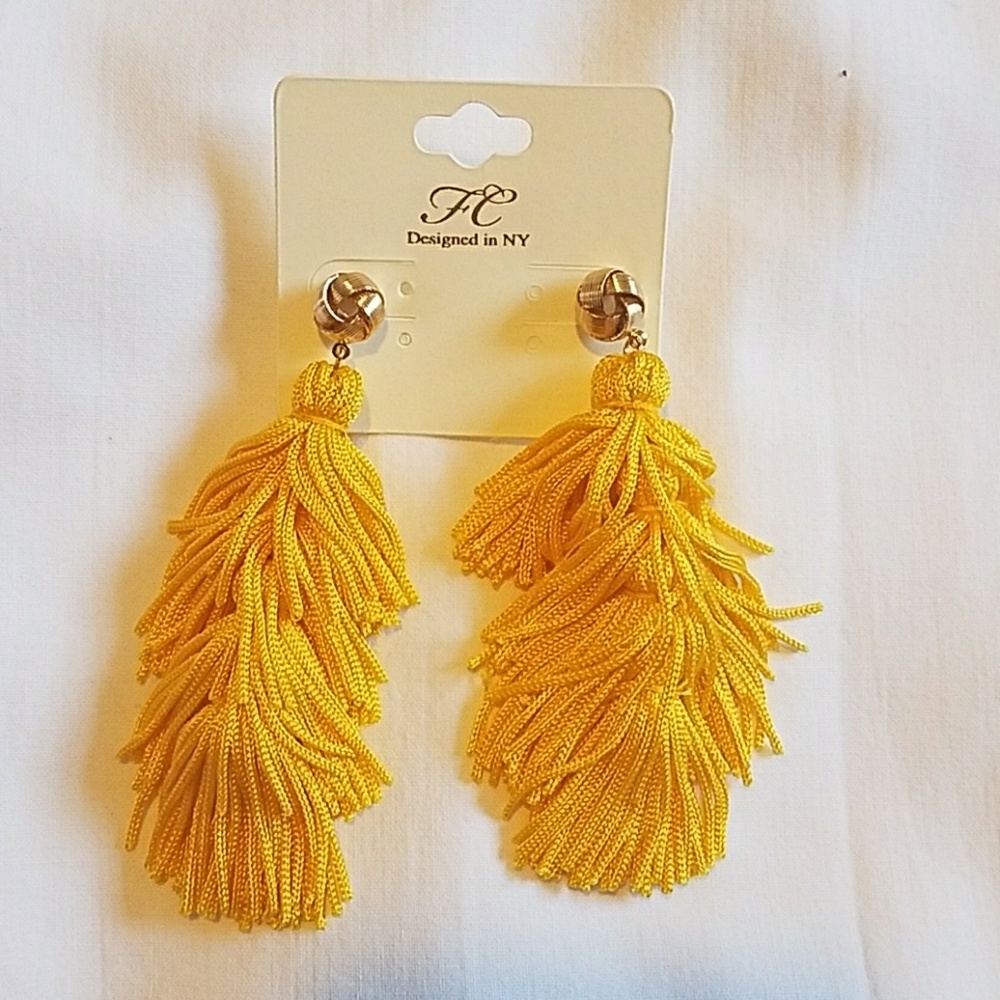 Yellow tassle earrings.
